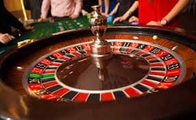 Tangkapan layar permainan Fortune Ox dengan gulungan, simbol, dan panel kontrol taruhan di target77